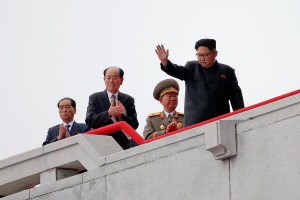 North Korean leader Kim Jong Un is accompanied by high party and military officials as he presides over a mass rally and parade in the capital's main ceremonial square, a day after the ruling party wrapped up its first congress in 36 years by elevating him to party chairman, in Pyongyang, North Korea, May 10, 2016. REUTERS/Damir Sagolj ORG XMIT: DSP45