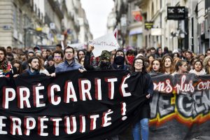 Young people hold a banner as thousands of people demonstrate on March 9, 2016 in Nantes, western France, as part a nationwide day of protest against proposed labour reforms.
France faced a wave of protests against deeply unpopular labour reforms that have divided an already-fractured Socialist government and raised hackles in a country accustomed to iron-clad job security. / AFP / LOIC VENANCELOIC VENANCE/AFP/Getty Images ** OUTS - ELSENT, FPG, CM - OUTS * NM, PH, VA if sourced by CT, LA or MoD **