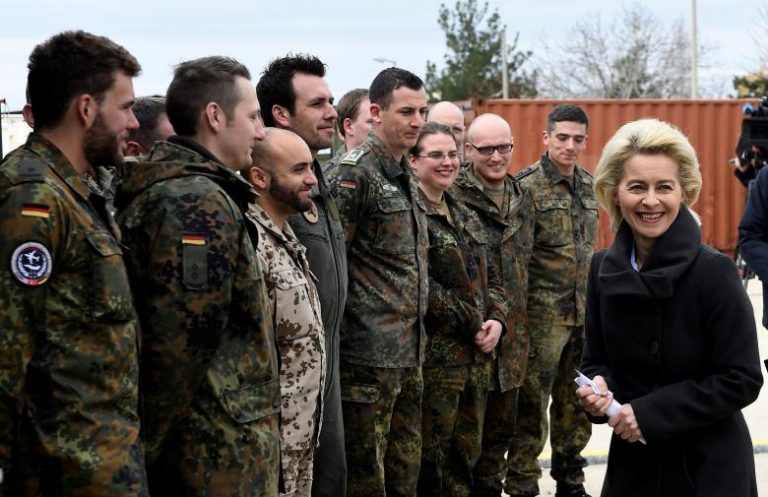 FILE PHOTO: German Defence Minister Ursula von der Leyen chats with soldiers during a visit of the German Armed Forces Bundeswehr at the air base in Incirlik, Turkey, January 21, 2016. REUTERS/Tobias Schwarz/Pool/File Photo