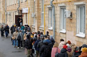 Russia sees polling station protests as Putin set to extend long rule