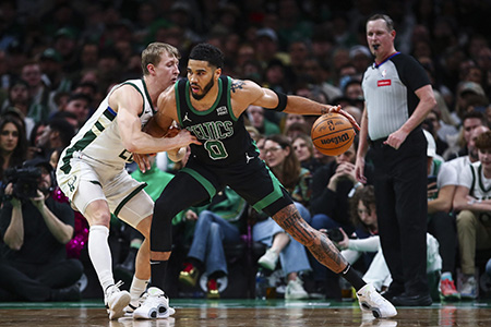 BOSTON, MA - MARCH 20: Jayson Tatum #0 of the Boston Celtics posts up against AJ Green #20 of the Milwaukee Bucks in the first half at TD Garden on March 20, 2024 in Boston, Massachusetts. NOTE TO USER: User expressly acknowledges and agrees that, by downloading and or using this photograph, User is consenting to the terms and conditions of the Getty Images License Agreement.   Adam Glanzman/Getty Images/AFP (Photo by Adam Glanzman / GETTY IMAGES NORTH AMERICA / Getty Images via AFP)